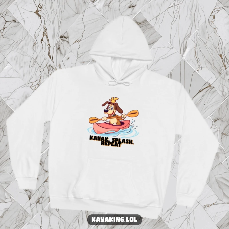 Funny Hoodie depicting a goofy dog splashing water with a paddle in a kayak, a cozy and humorous statement piece.