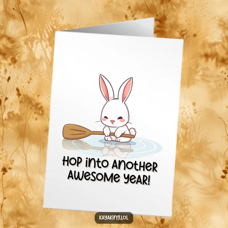 Funny Free Printable Birthday Card: A cute bunny playfully dips its oar into the water while kayaking for a birthday wish.