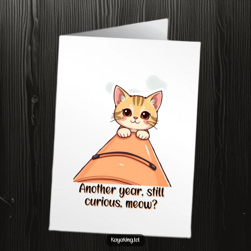 Funny Free Printable Birthday Card: A curious cat peeks with wide eyes over the edge of a kayak.