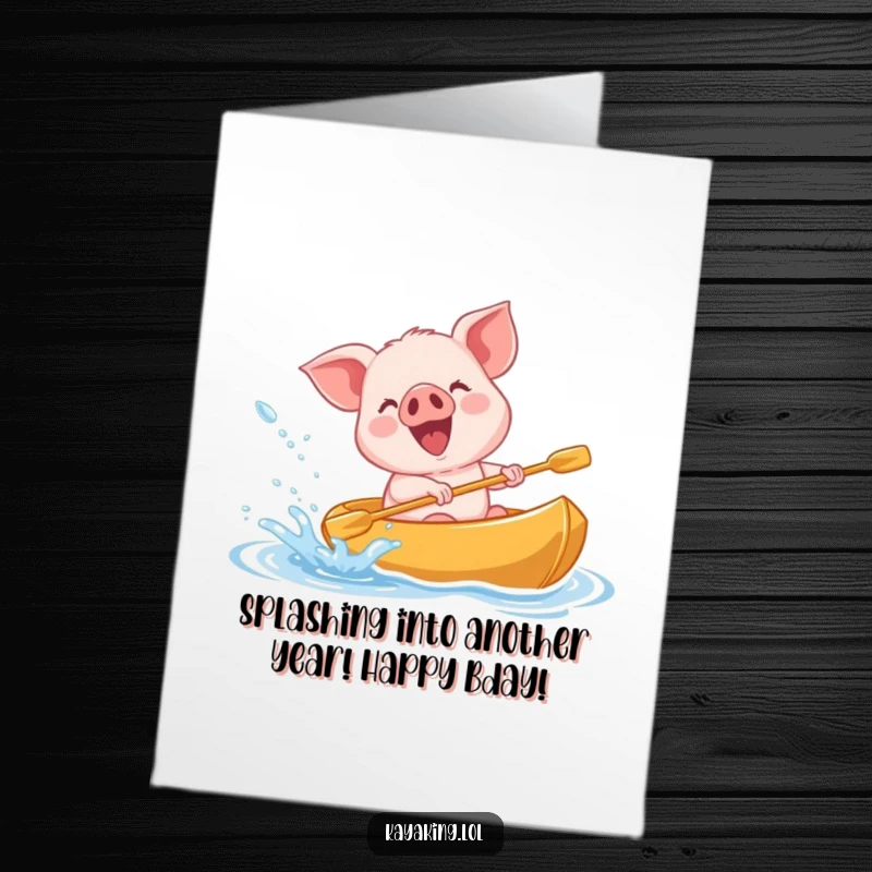 Funny Free Printable Birthday Card showing a joyous giggling piglet gleefully splashing water from its kayak.