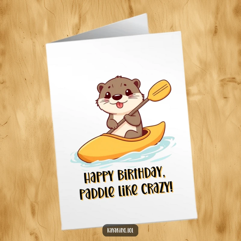 Funny free printable birthday card showing a happy otter steering a kayak with a comically large paddle.