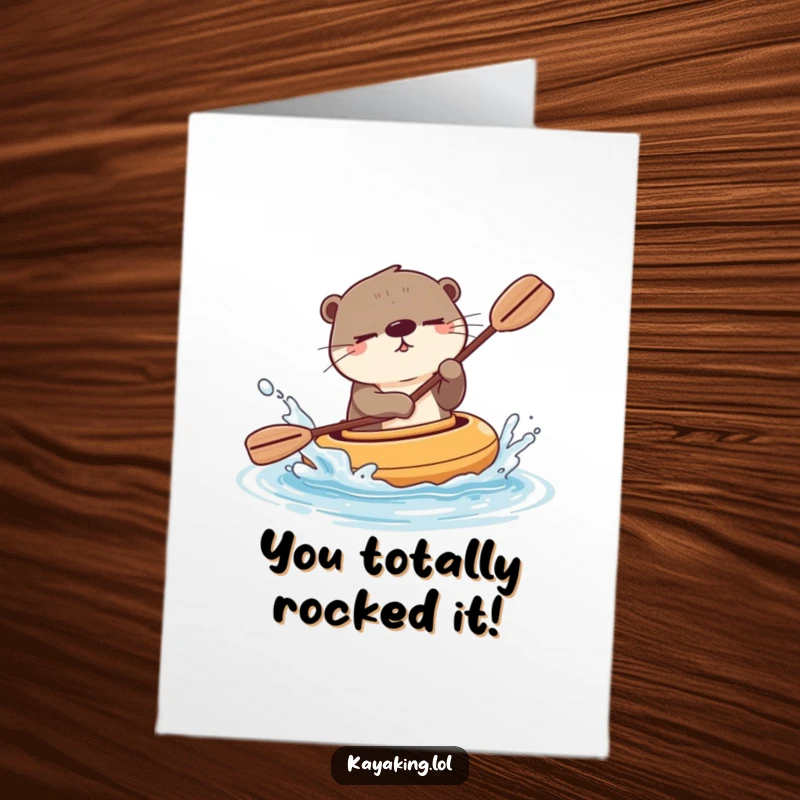 Funny Free Printable Congratulations Card: A winking otter in a kayak makes a playful splash to celebrate your success.