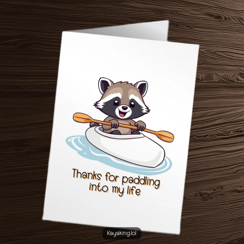 Funny Free Printable Thank You Card: Raccoon in kayak, paw on paddle, sending thanks with a humorous printable touch.