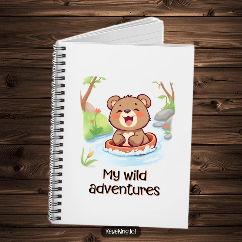 Funny notebook with a laughing bear cub enjoying a carefree glide down a stream, ready to capture inspired thoughts.