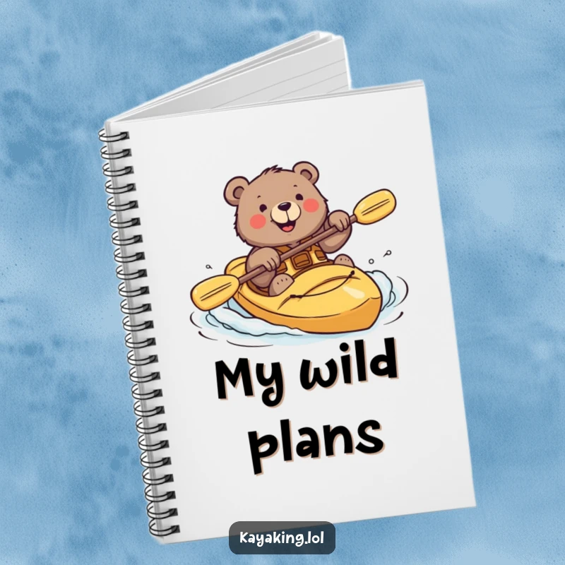 Funny notebook with a brave bear smiling while attempting a kayak roll, designed for jotting down bold ideas.