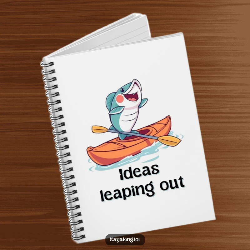 Funny fish kayaking notebook featuring a joyful fish leaping from a kayak, ideal for jotting down fishing notes with humor.