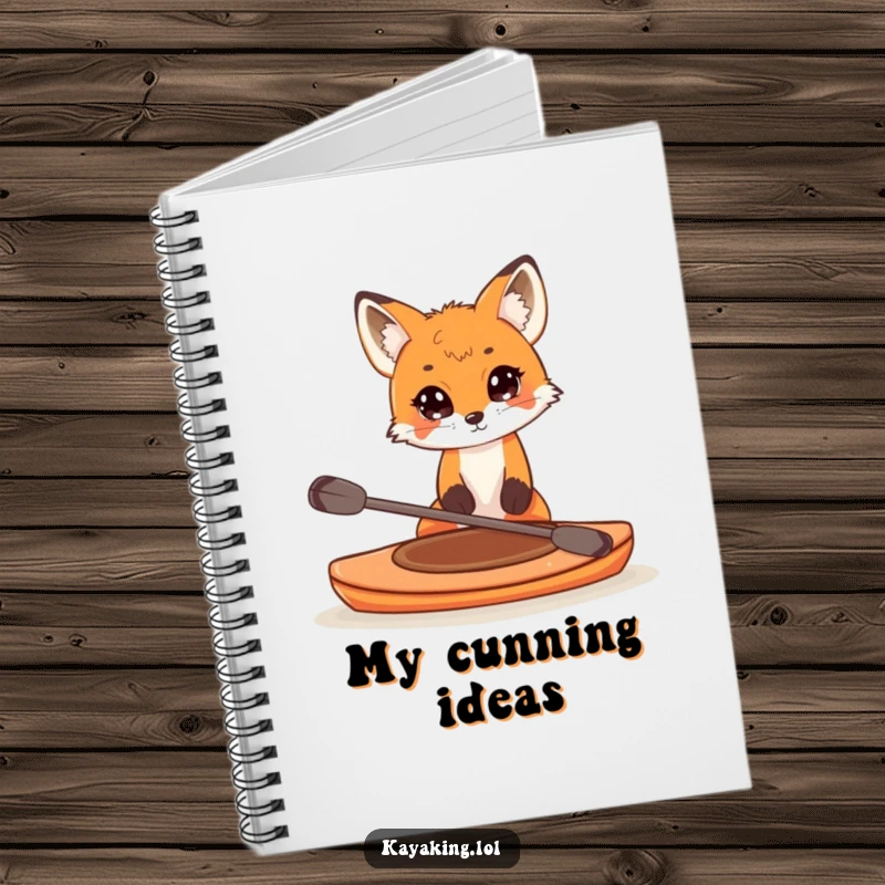Funny notebook with a curious fox peering over the edge of a small kayak, perfect for journaling and creative exploration.