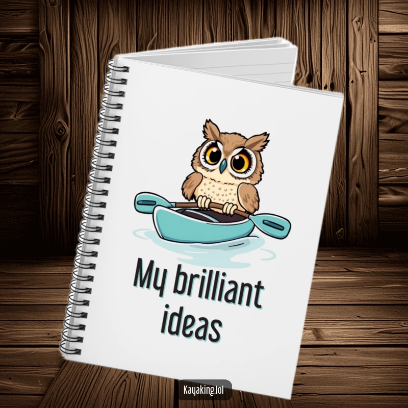 Funny owl notebook with a startled bird in a kayak, its wide-eyed panic a humorous visual for note-taking and journaling enthusiasts.