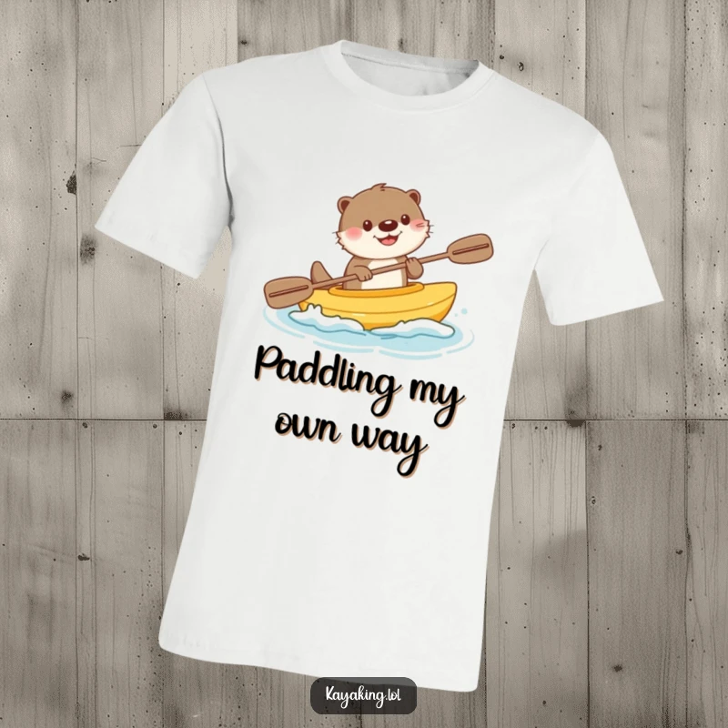 Funny t-shirt showing a happy otter joyfully kayaking with a cheerful splash, embodying pure water-based fun and excitement.