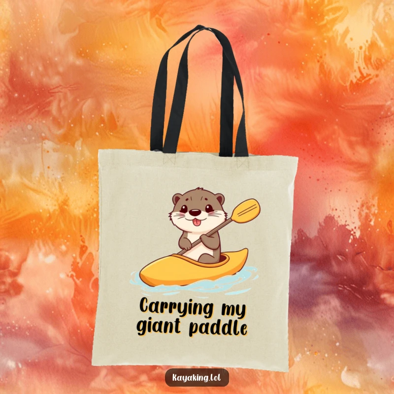 Funny tote bag featuring a happy otter steering a kayak with a comically large paddle, a practical and hilarious accessory.