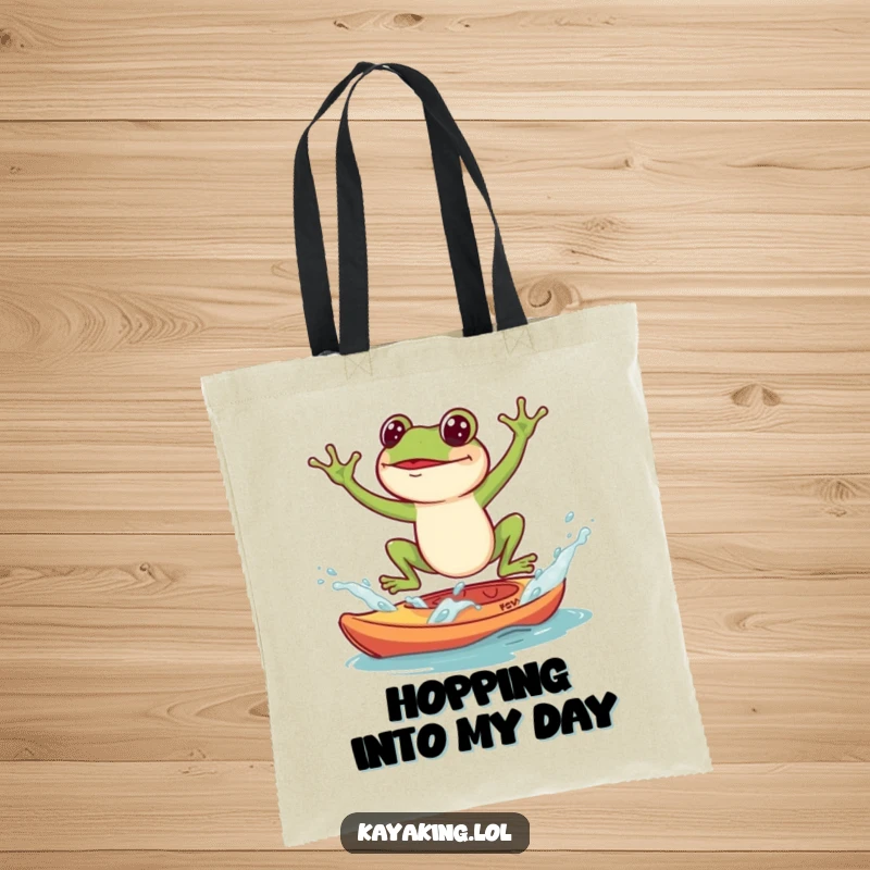 Funny Tote Bag, a frog splashing into a kayak, showcasing humorous water action and practical carrying.
